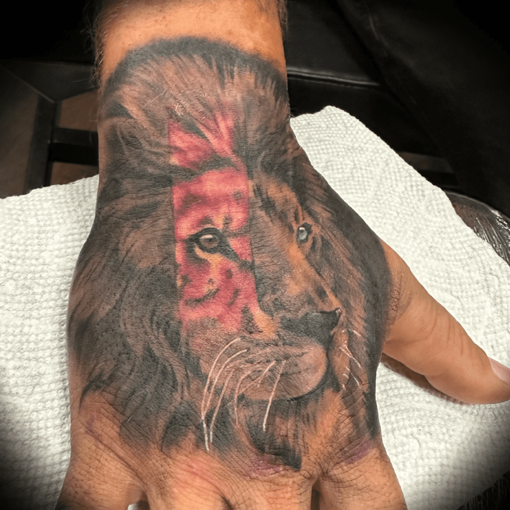 Lion tattoo on the hand