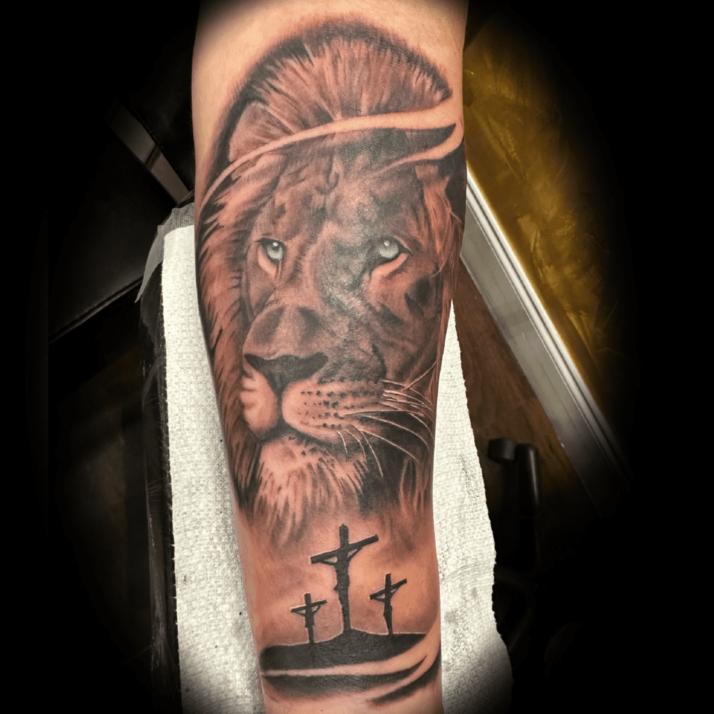 Black and grey realism lion and 3 crosses